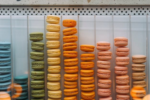 From above display case with macaroons