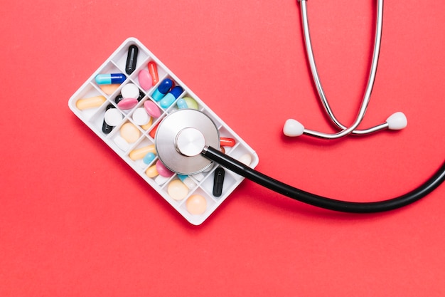 Free Photo from above stethoscope on pills