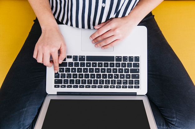 Free photo from above woman using laptop