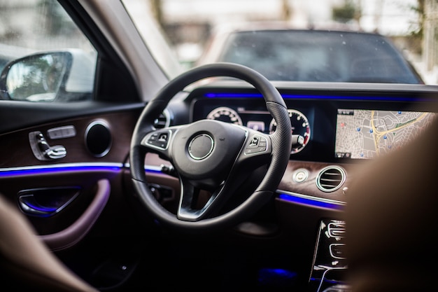 Front left seat and direction control wheel of a car.