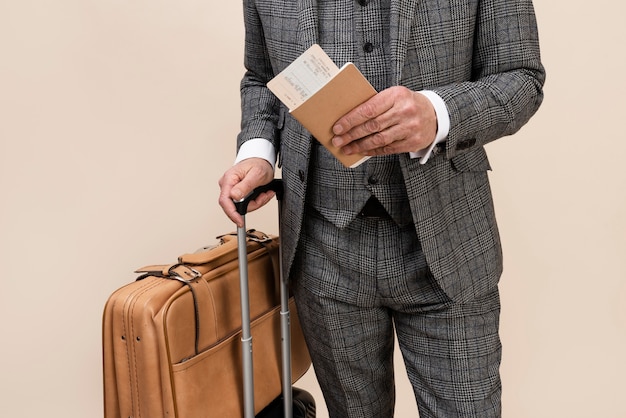 Front view adult holding passport