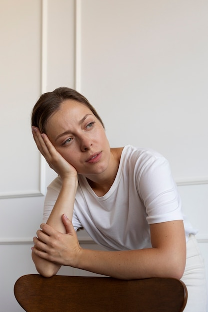 Front view anxious woman inside