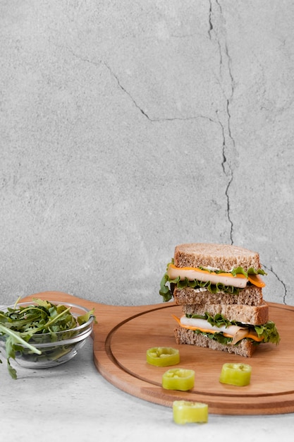 Free Photo front view arrangement of delicious sandwiches with copy space