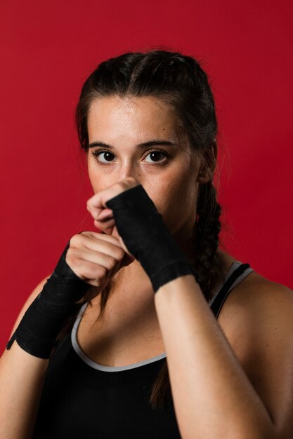 Front view of athletic woman in fitness clothes