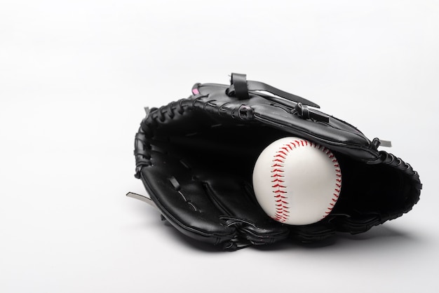 Front view of baseball in glove with copy space