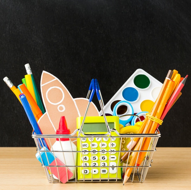 Free photo front view of basket with back to school essentials