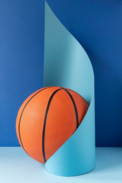 Free photo front view of basketball with paper shape