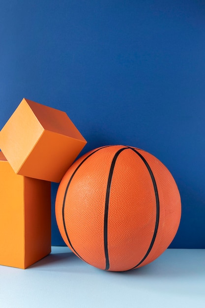 Front view of basketball with shapes and copy space