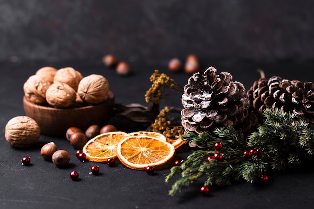 Front view beautiful christmas arrangement with sliced orange