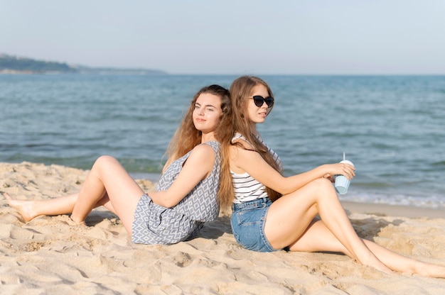 Front view of beautiful girls at beach