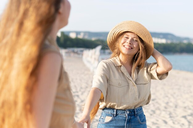 Front view of beautiful girls at beach