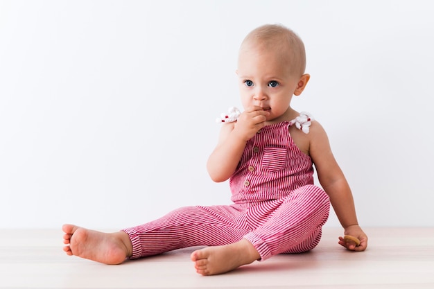 Free photo front view of beautiful smiling baby girl