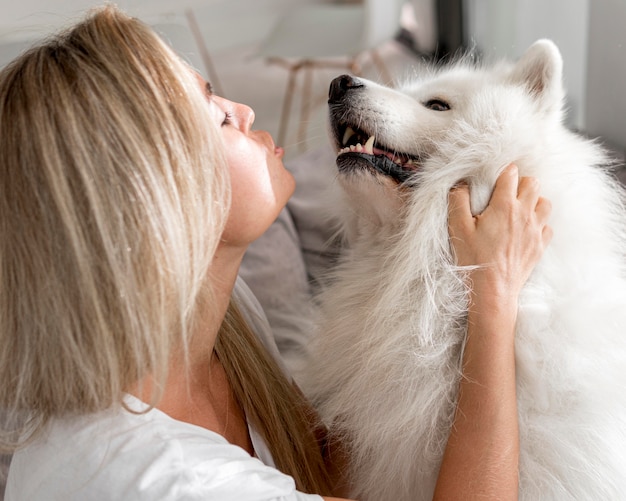 Free Photo front view of beautiful woman and dog