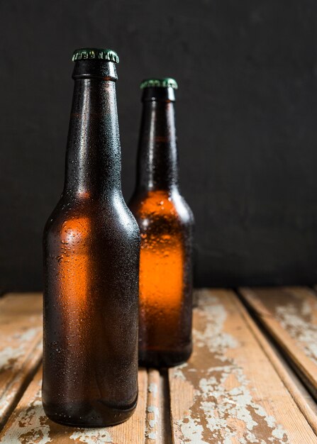 Front view of beer glass bottles