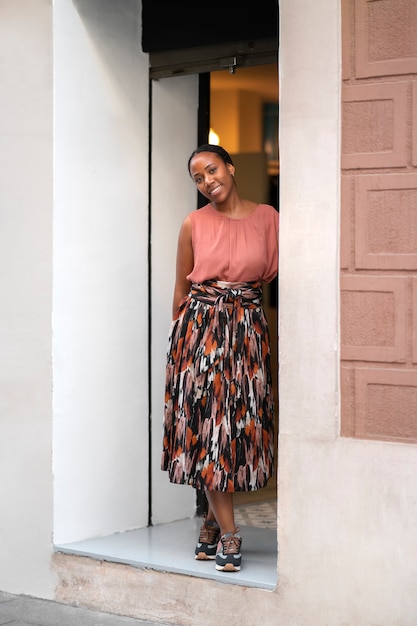 Front view black woman running a small business