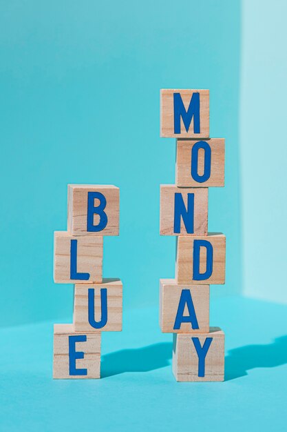 Front view of blue monday concept with cubes