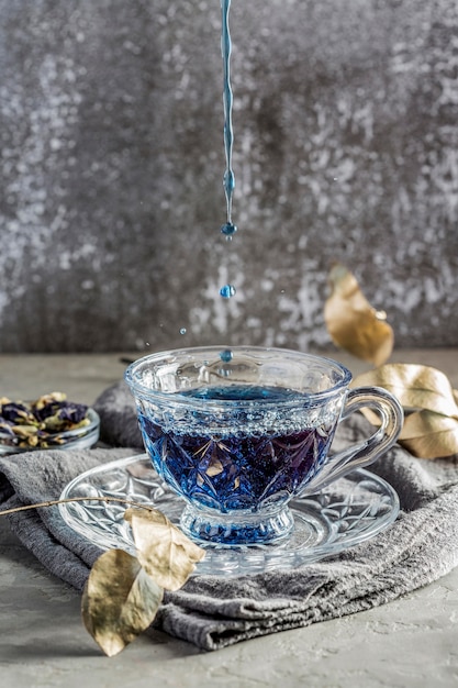 Free Photo front view of blue tea concept with copy space