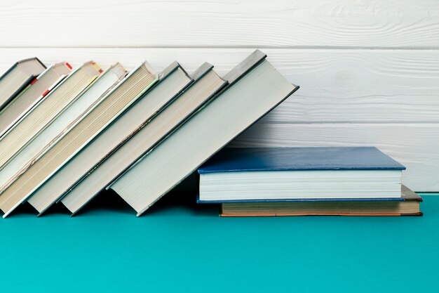 Front view books on blue table