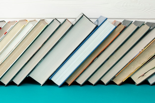 Front view books on blue table