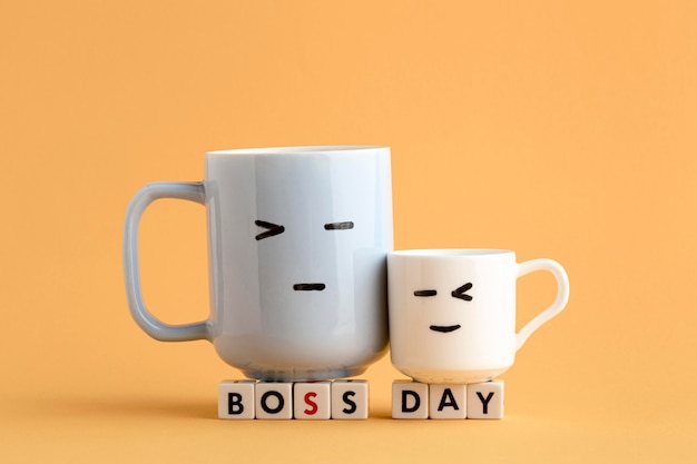 Free photo front view of boss day concept with cups