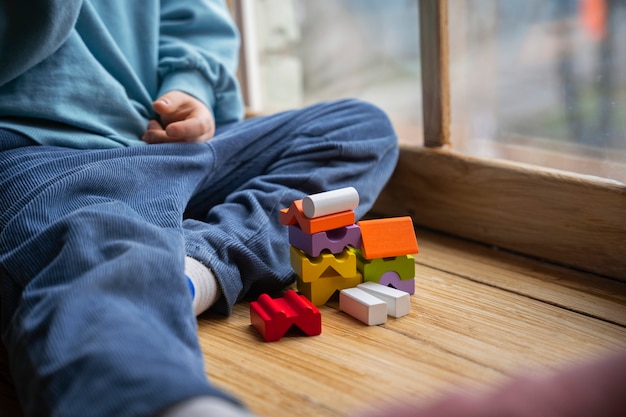 Free Photo front view boy playing memory game