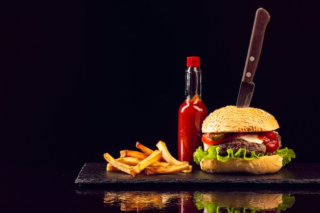 Front view burger with french fries