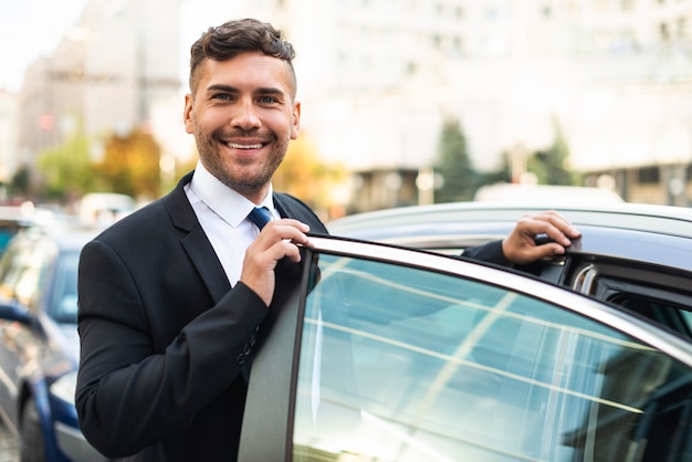 Free Photo front view business man and car