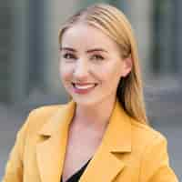 Free photo front view of business woman in suit