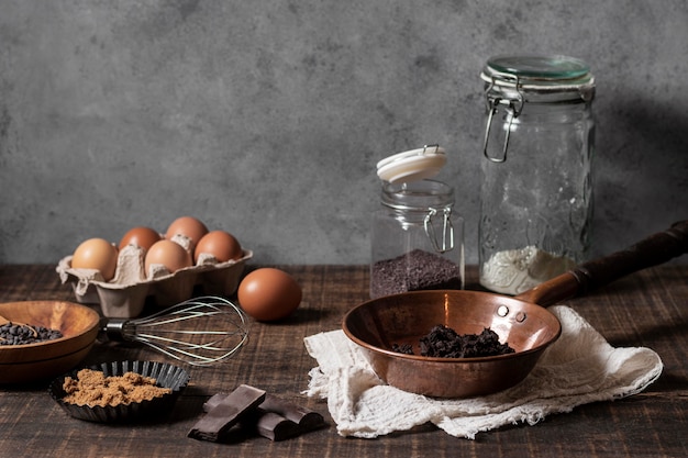 Front view of cake ingredients on table