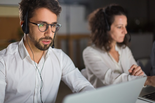 Free photo front view of call center operator communicating with client