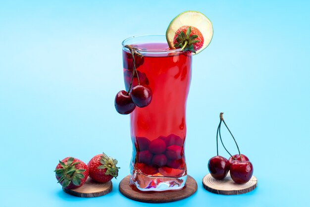 A front view cherry cocktail with fresh red fruits ice cooling on blue, drink juice cocktail fruit color