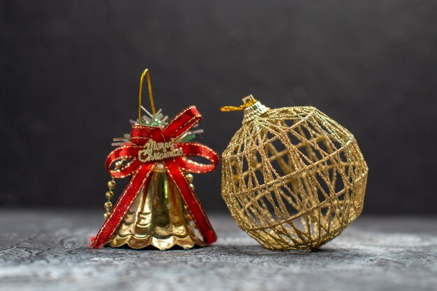 Front view christmas bell on dark table