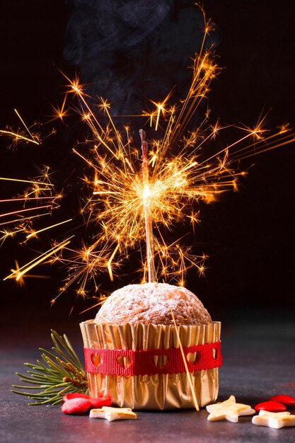 Front view of christmas cupcake with sparkler