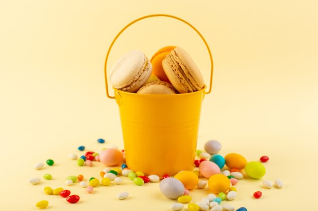 A front view colorful candies with french macarons