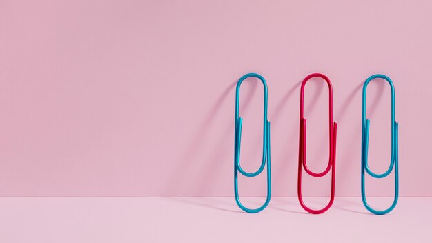 Front view colourful paper clips with copy space