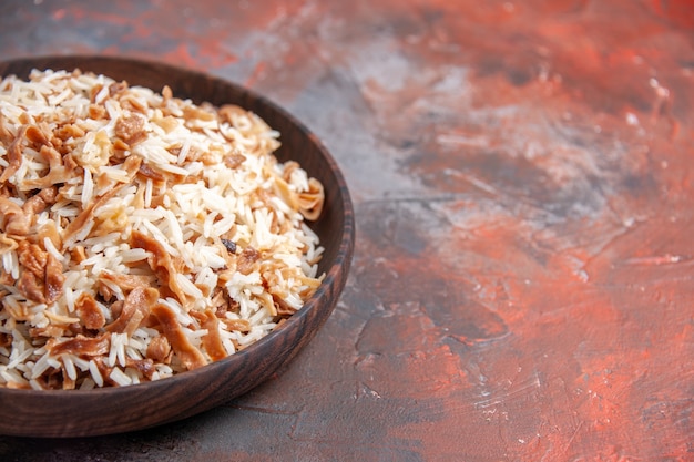 Free photo front view cooked rice with dough slices on dark surface dish meal food ph