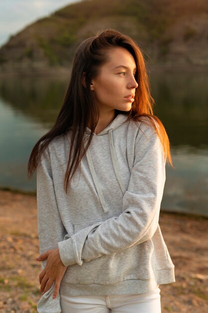 Front view cool woman posing outdoors