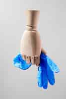 Free photo front view of coronavirus concept with gloves