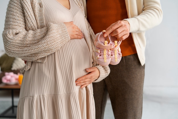 Free Photo front view couple at gender reveal party