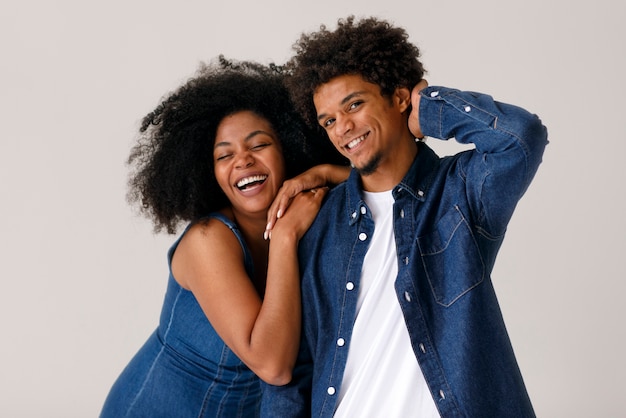 Free photo front view couple with afro hairstyles