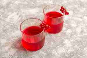 Free photo front view of cranberry juice red colored on the light surface