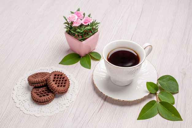 Front view cup of tea with cookies on the white table sugar tea cookie sweet biscuit