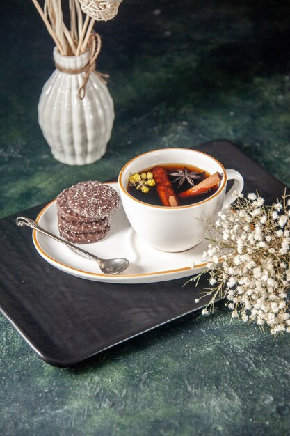 front view cup of tea with sweet biscuits in plate and tray on dark surface ceremony glass sweet breakfast color cake dessert