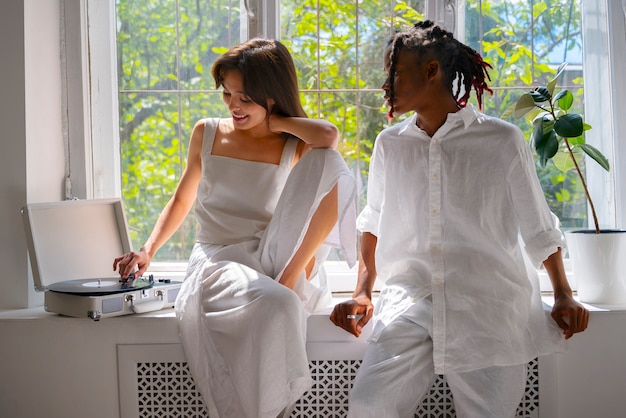 Front view cute couple wearing linen clothing