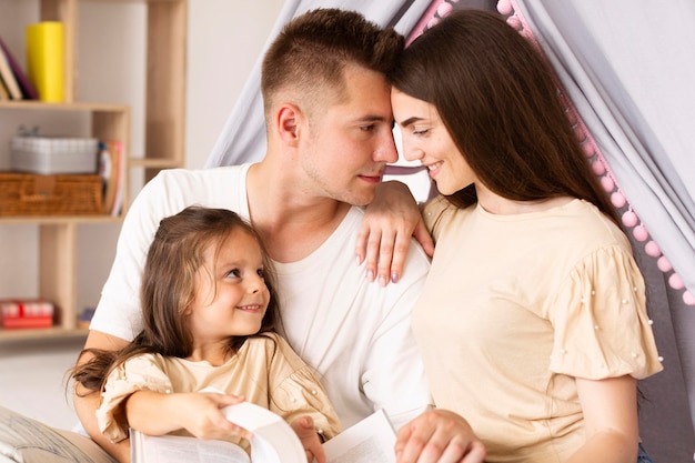 Front view cute family having a special moment together