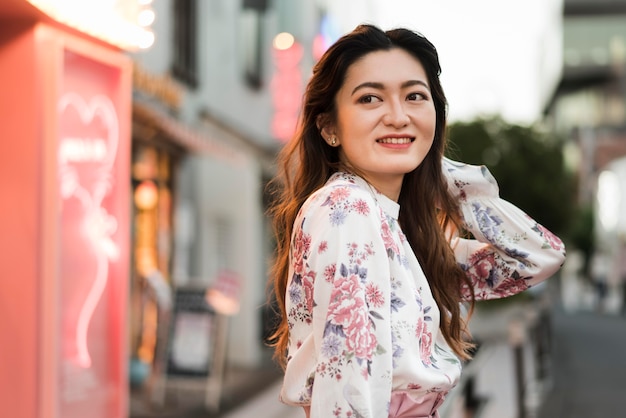 Free photo front view of cute japanese girl in tokyo