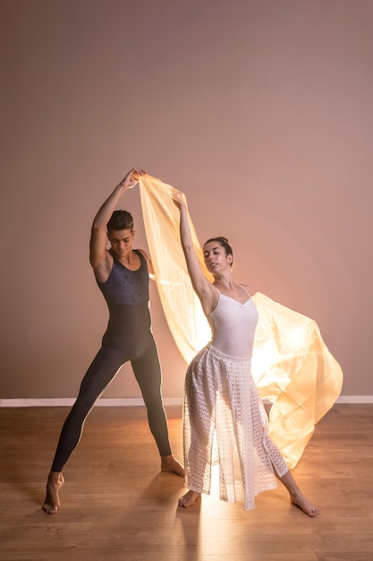 Front view dancers couple posing together