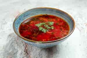 Free photo front view delicious borsch famous ukranian beet soup with meat inside plate on white space