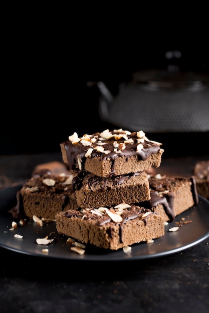 Free Photo front view of delicious chocolate cake with almonds