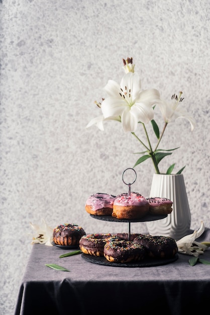 Free photo front view of delicious donuts concept